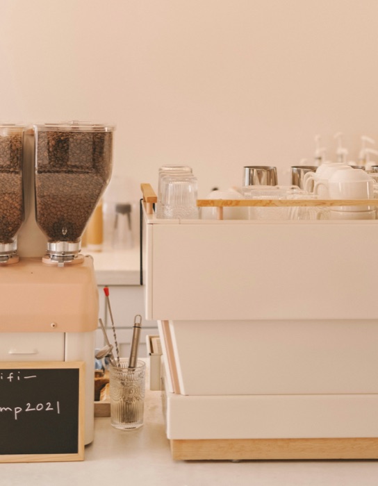 Espresso machine and coffee grinder on a cafe counter